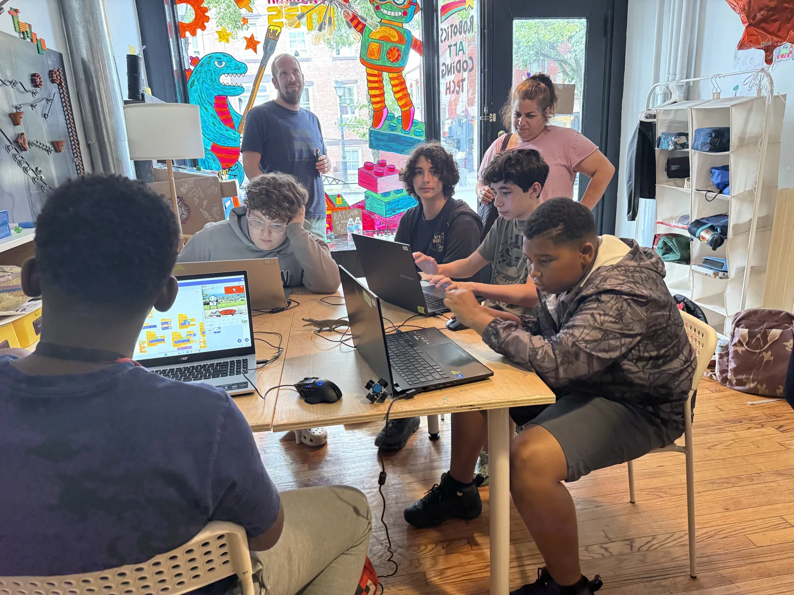 Students designing and playing games together