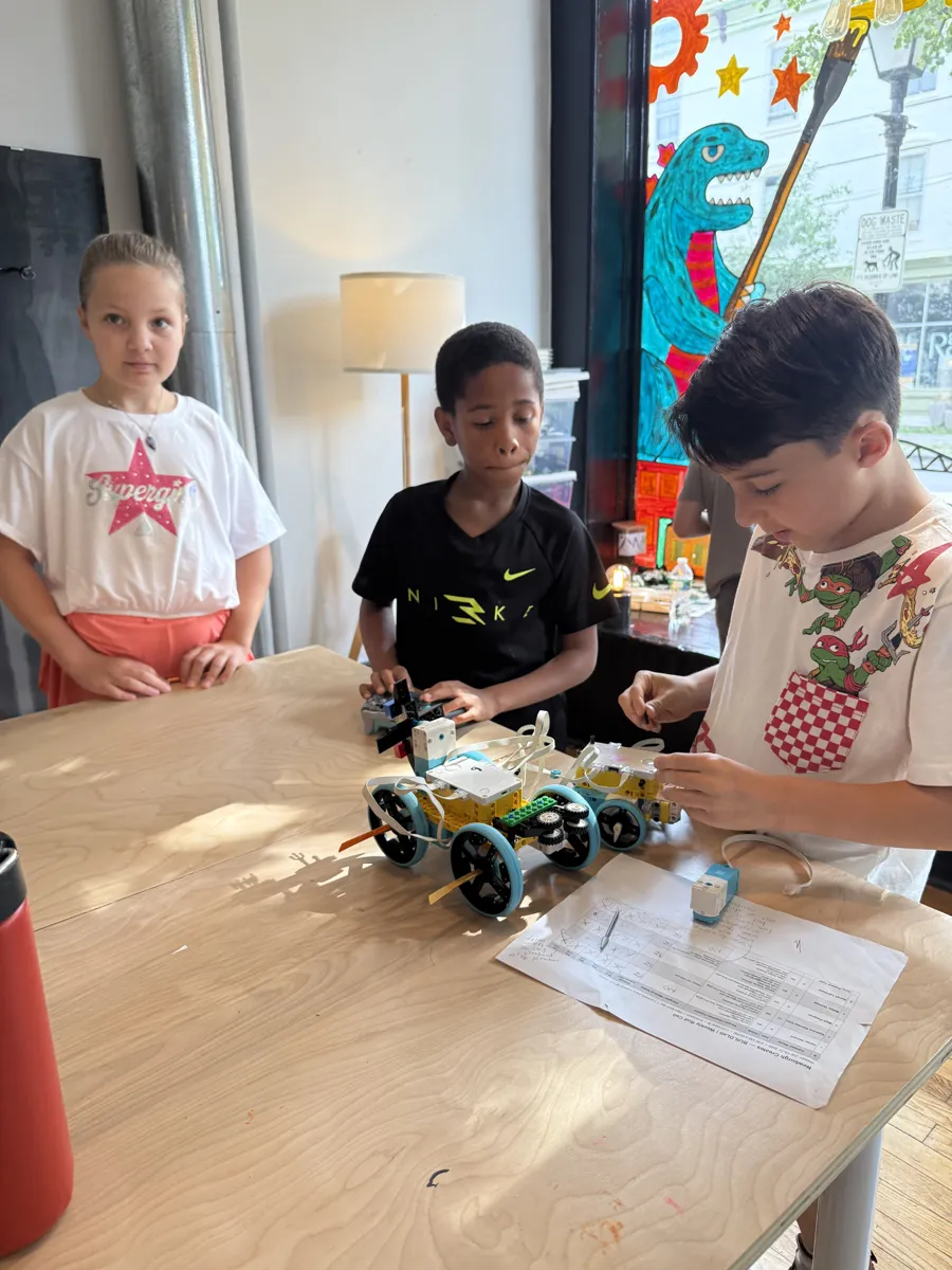 Teammates testing the robot together