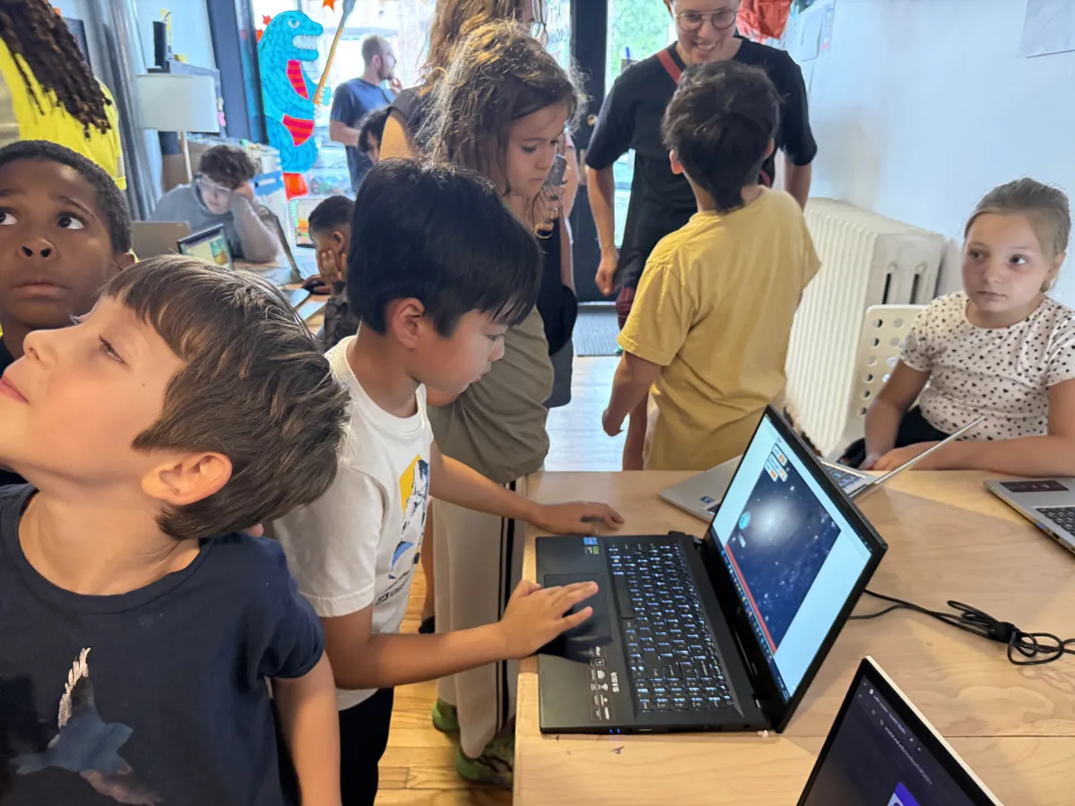 Students gathered around a game build
