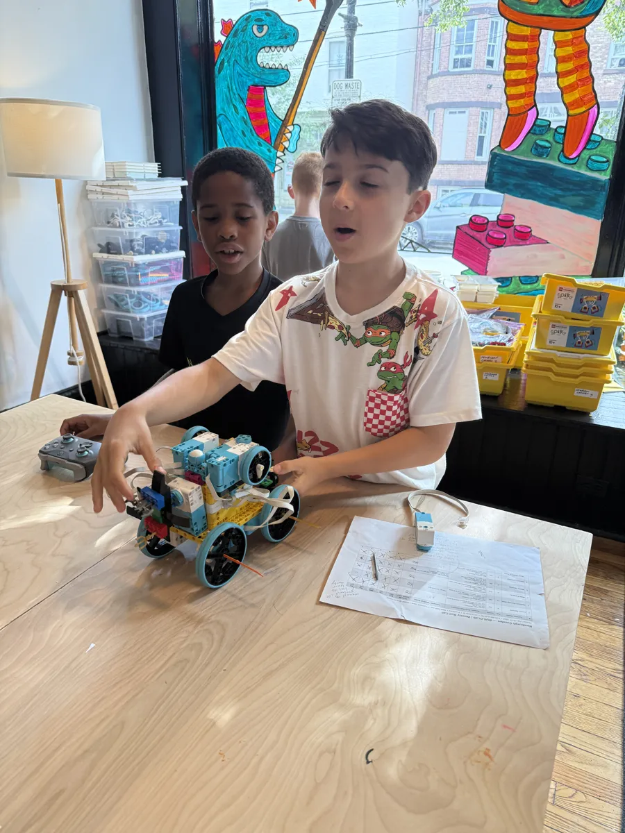 Students troubleshooting their robot build