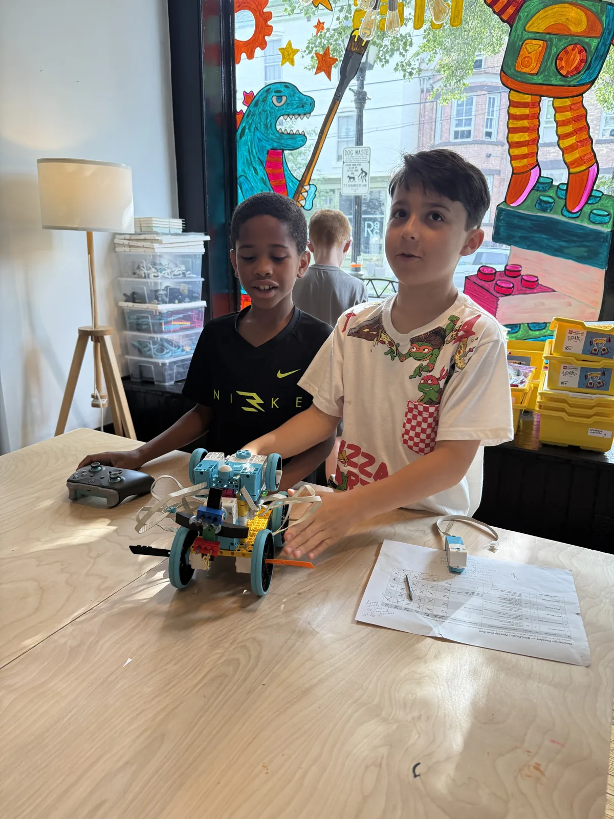 Students working on robots in ROBOLab