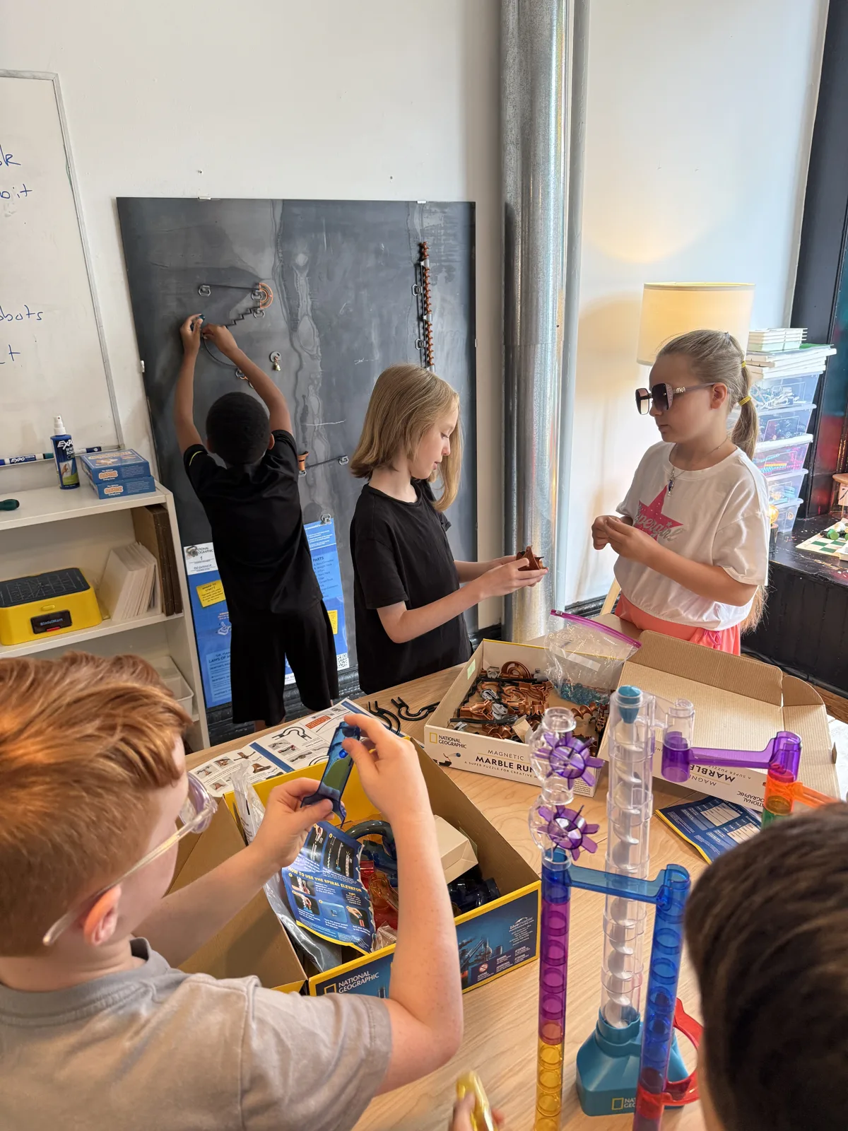 Students building robots in the Newburgh Creates studio
