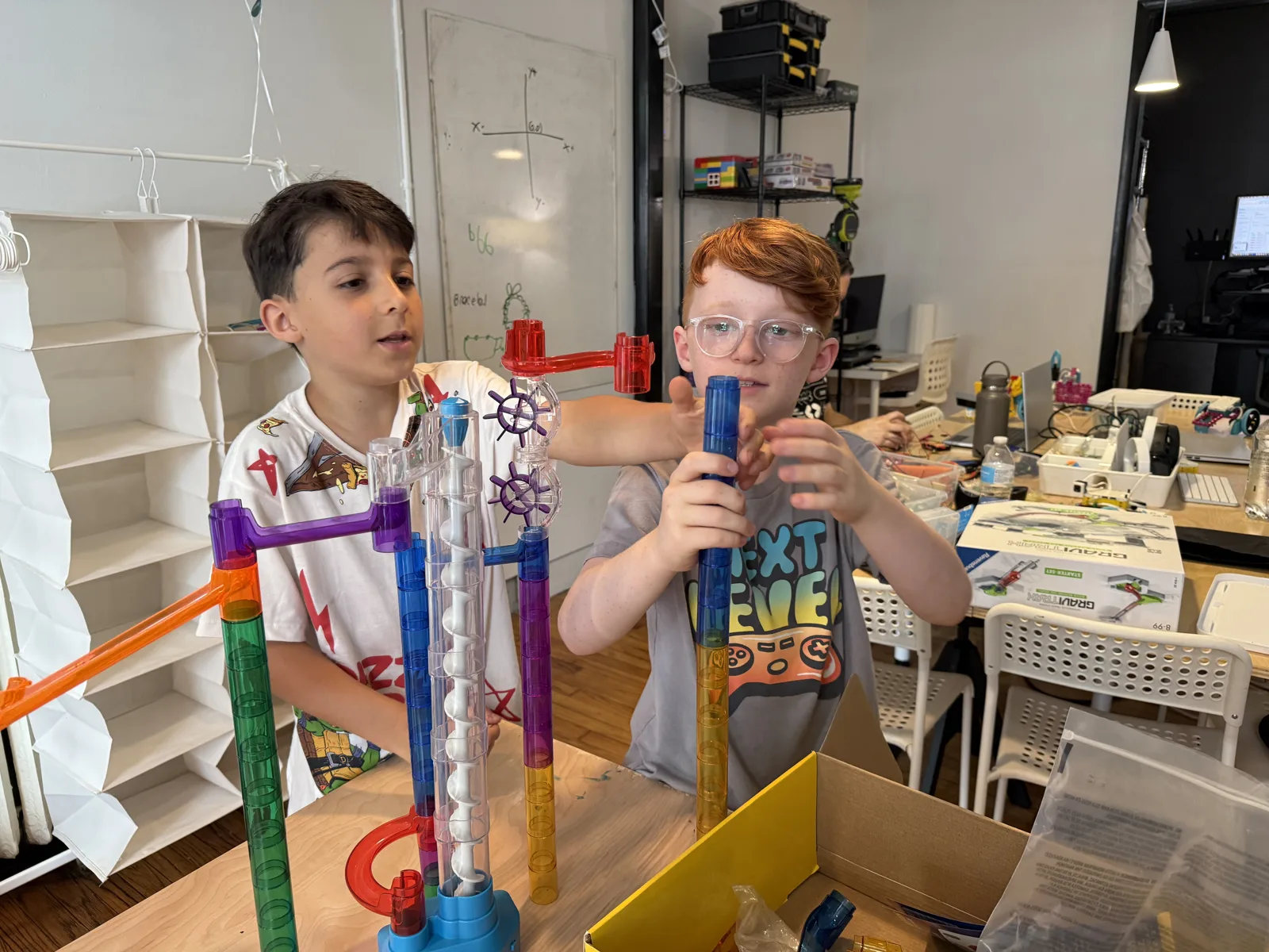 Students building a marble run