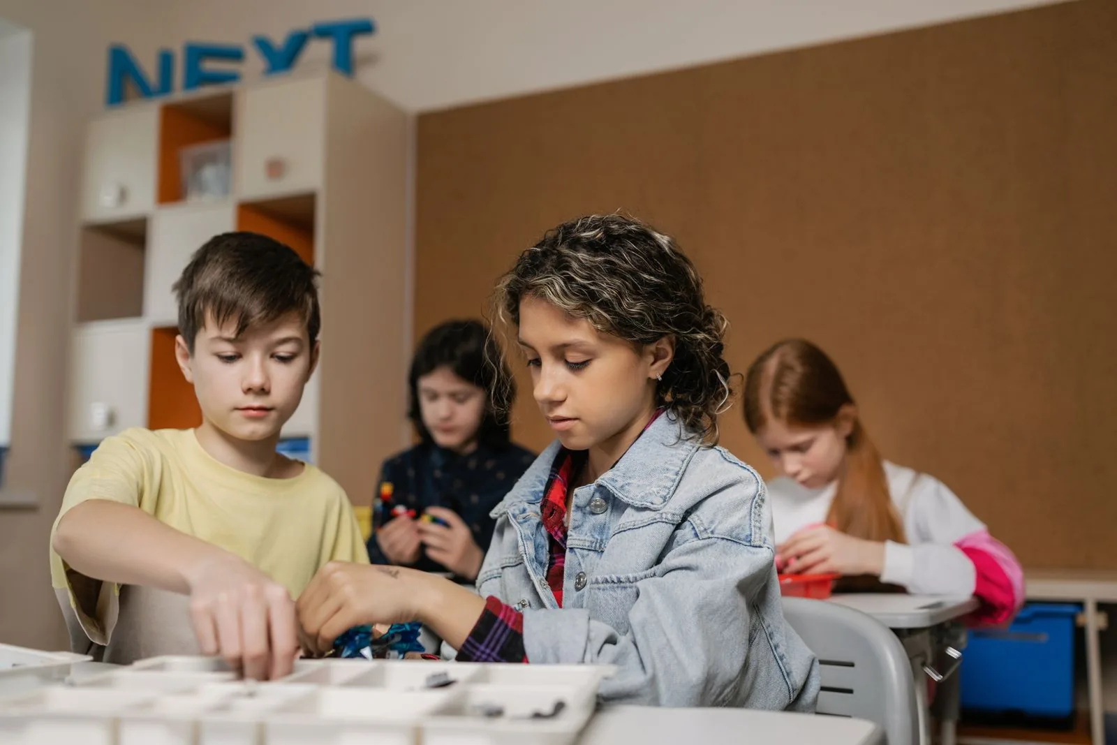 Young students working together on a hands-on building project