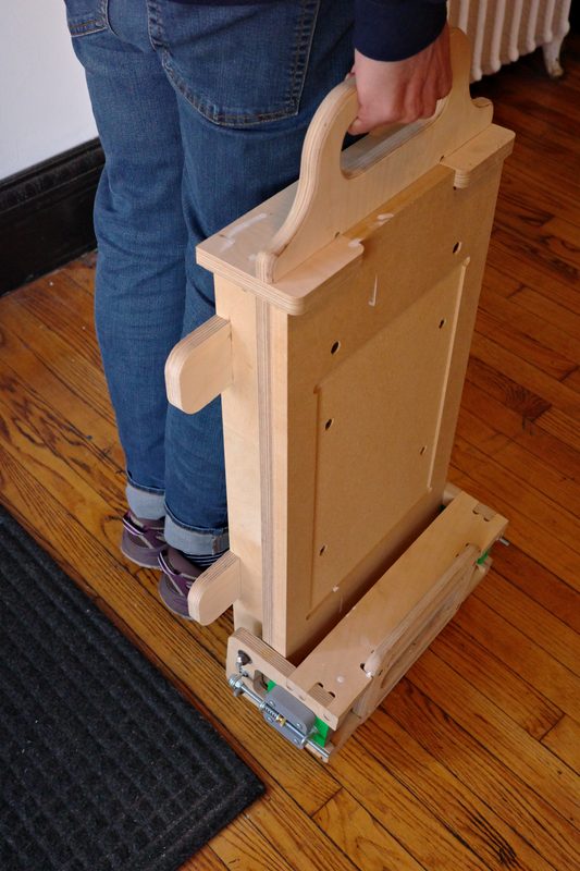 Carrying the press by its built-in handle