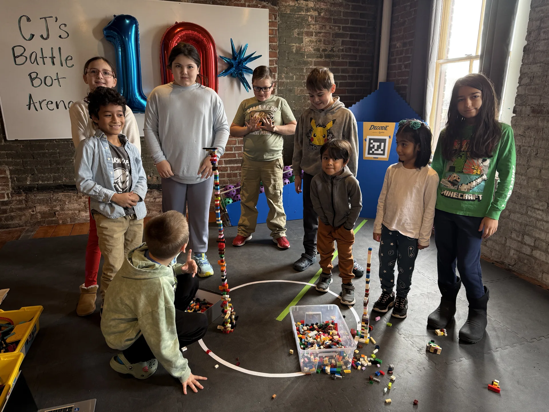 Kids celebrating a birthday party with robotics activities at Newburgh Creates in Newburgh NY